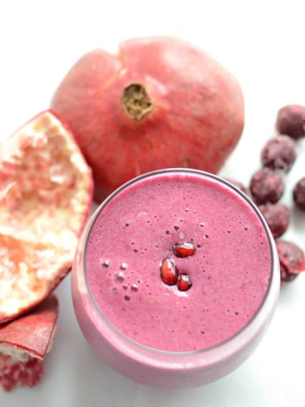 Cup of sour cherry pomegranate detox fruit smoothie