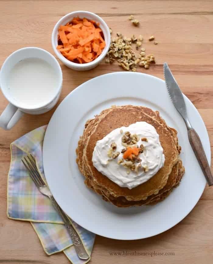 Whole Grain Carrot Cake Pancakes with Maple Cream Cheese Whipped Cream (naturally sweetened too!)