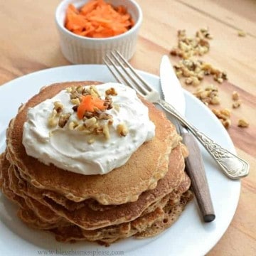 Whole grain carrot cake pancakes are full of spices and just the right amount of carrot. Top them with a simple maple sweetened cream cheese topping!