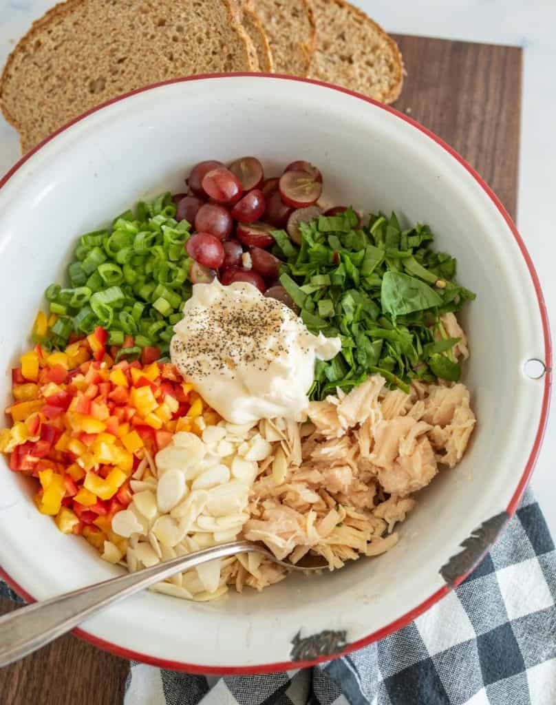 top view of ingredients for chicken salad in a bowl