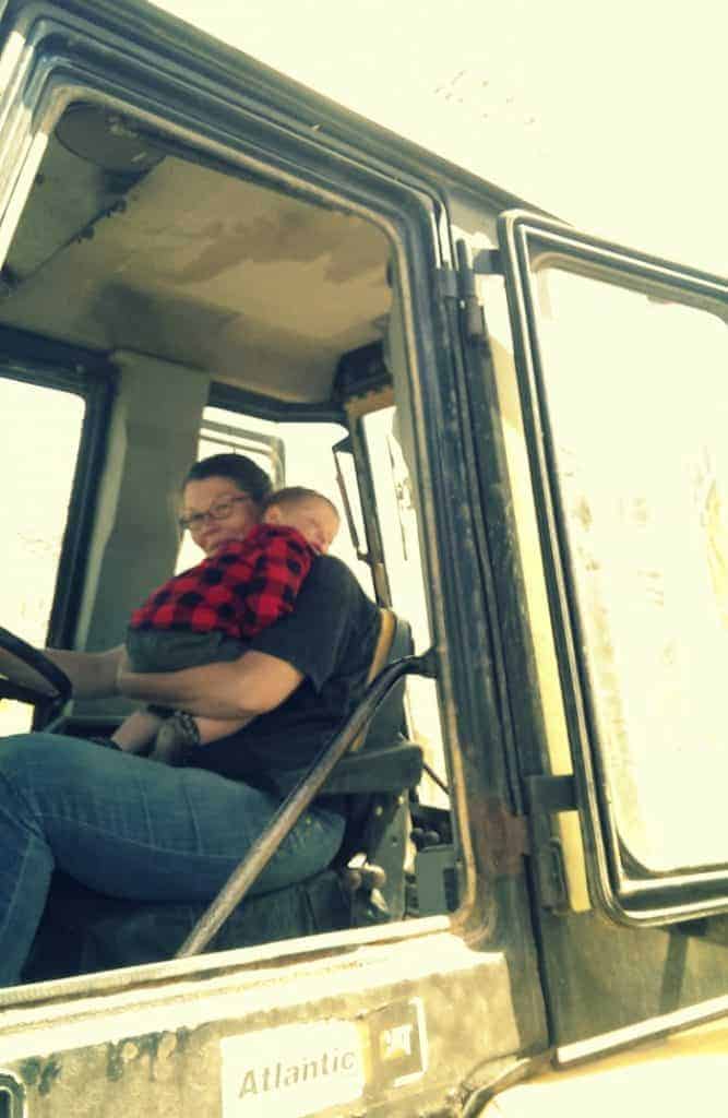 paul and mom in the backhoe