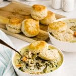 bowls of chicken pot pie with biscuits