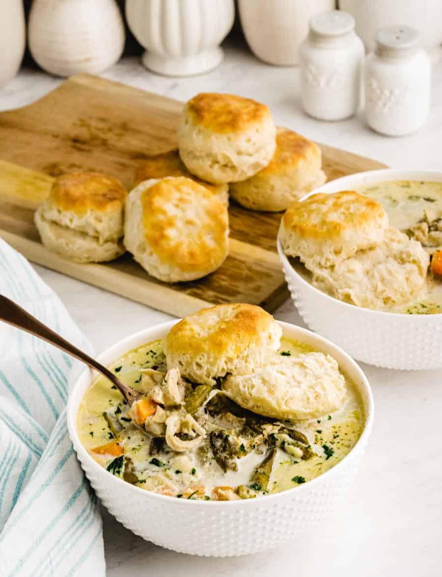 bowls of chicken pot pie with biscuits