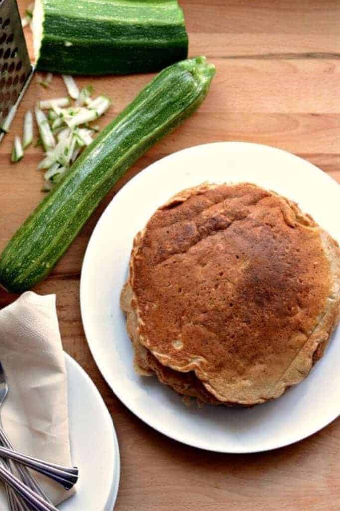 zucchini bread pancakes in a stack