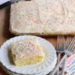 piece of vanilla sheet cake on a white plate