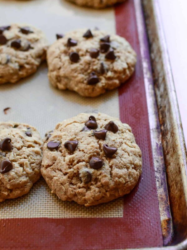 Healthy oatmeal chocolate chip cookies recipe made with honey and whole wheat flour. These cookies are thick, soft, and just sweet enough to satisfy your sweet tooth!