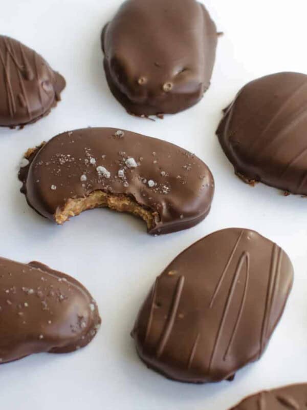 Homemade Healthy Reese's Peanut Butter Eggs made with peanut butter, maple syrup, whole wheat flour, vanilla, and chocolate will not disappoint!