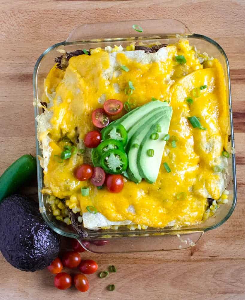 Corn Enchilada Bake - This Shredded Meat and Corn Enchilada Bake comes together quickly when you use leftover shredded meat and extra homemade green enchilada sauce.