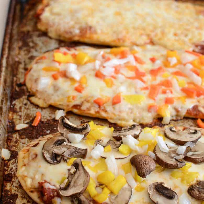 Easiest. Recipe. Ever. These kid-friendly flatbread pizzas are perfect to make for a quick lunch, easy dinner, after school snack.