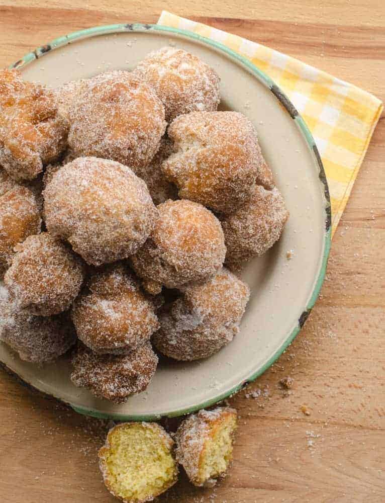 Pumpkin Donut Holes - Have no fear of frying and make these to celebrate something this fall. You won't regret it.