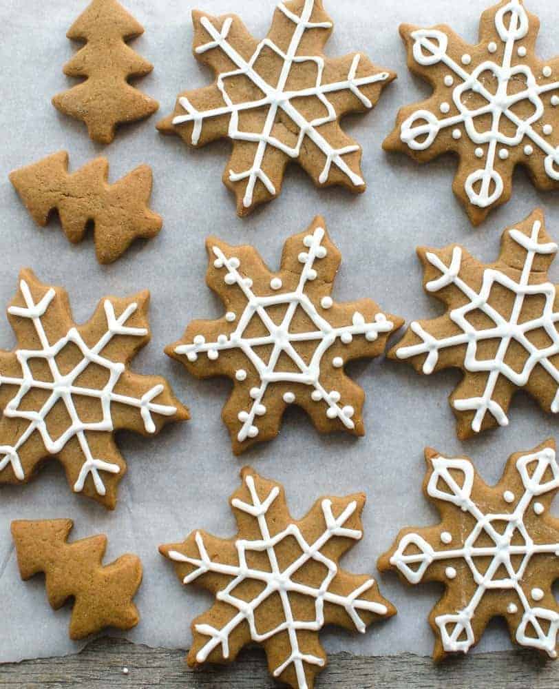 gingerbread snowflakes decorated with white icing