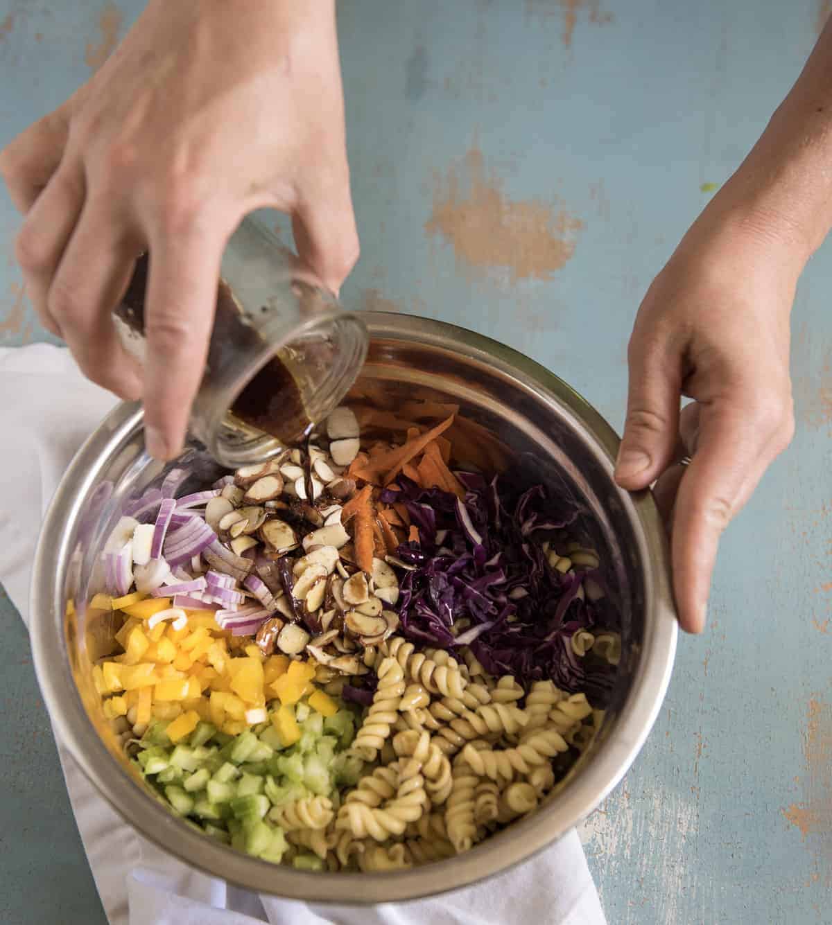 Asian Pasta Salad is made with chopped vegetables, pasta, a simple soy sauce dressing and it only takes about 20 minutes to make!