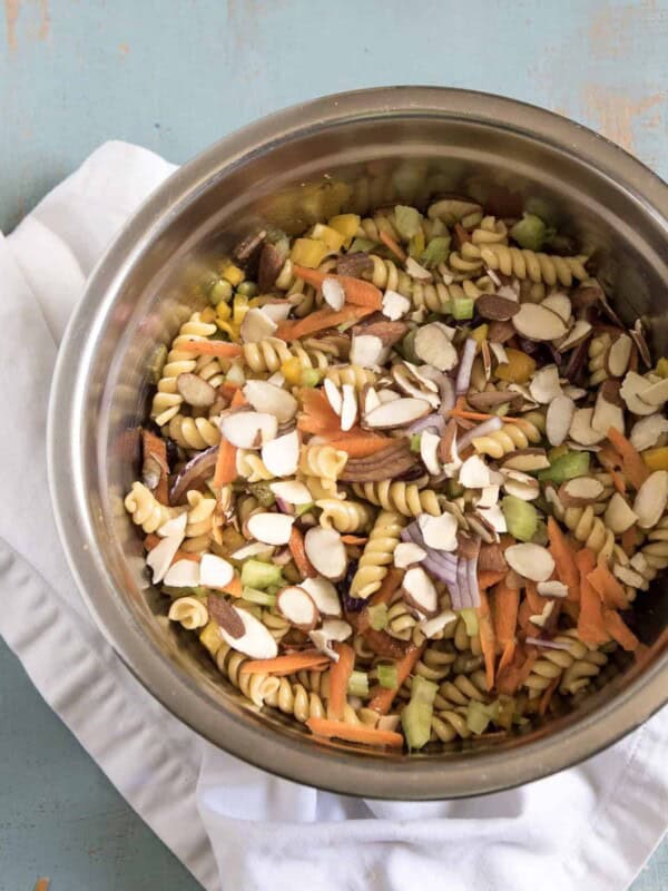 Asian Pasta salad in a metal bowl.