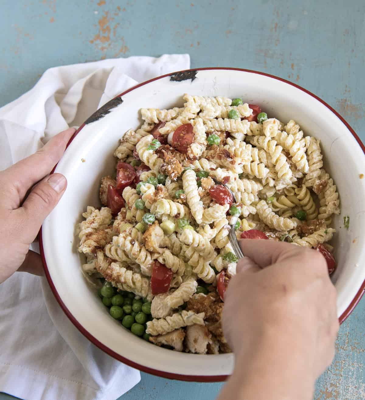 Chicken Bacon Ranch Pasta Salad is our favorite pasta salad recipe that comes together in about 20 minutes and the whole family loves it.