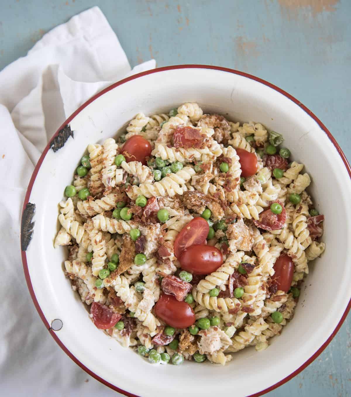 Chicken Bacon Ranch Pasta Salad is our favorite pasta salad recipe that comes together in about 20 minutes and the whole family loves it.