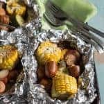 Image of grilled sausage and vegetable foil packets
