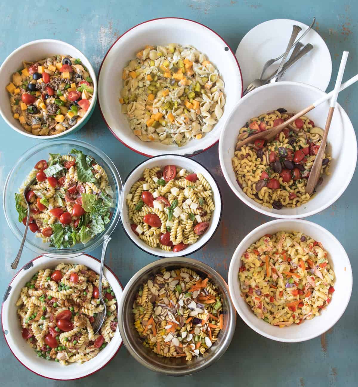8 of my favorite pasta salad recipes plus tips and tricks on making the best pasta salad ever. BLT, Asian, Italian, Pesto, and more!