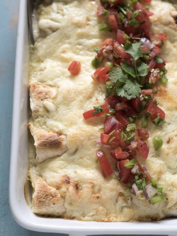 These chicken enchiladas are simple, family-friendly and only 7 ingredients!