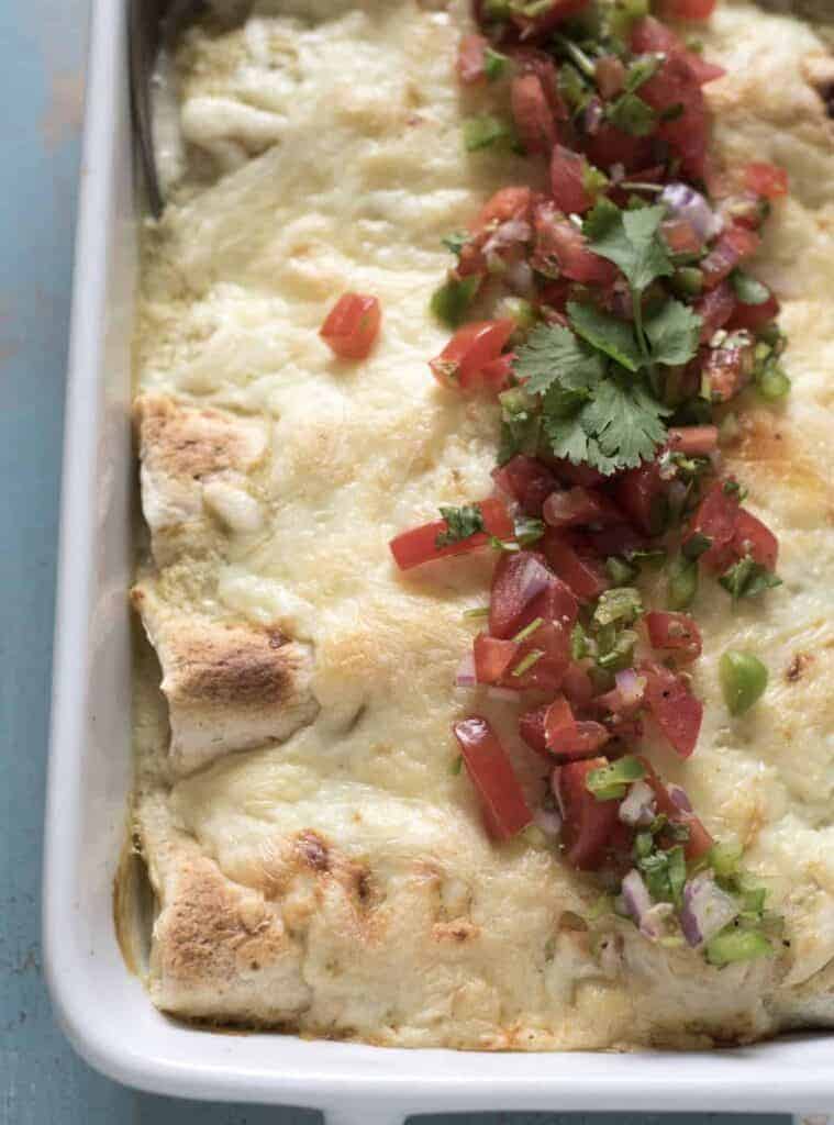 These chicken enchiladas are simple, family-friendly and only 7 ingredients!