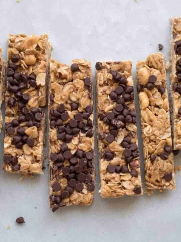 vertically chopped rustic looking granola bars with a generous amount of chocolate chips on top