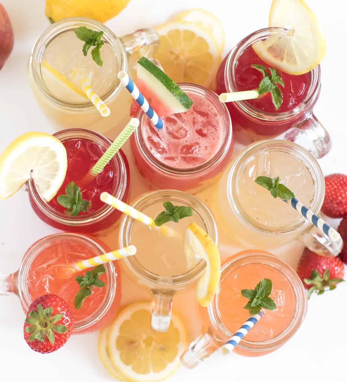 8 different homemade lemonade recipe all in one place! Learn how to make lemonade with fresh lemons or lemon juice in varieties like strawberry lemonade, raspberry lemonade, and even watermelon and tropical lemonade. This post will be your go-to guide for lemonade recipes.