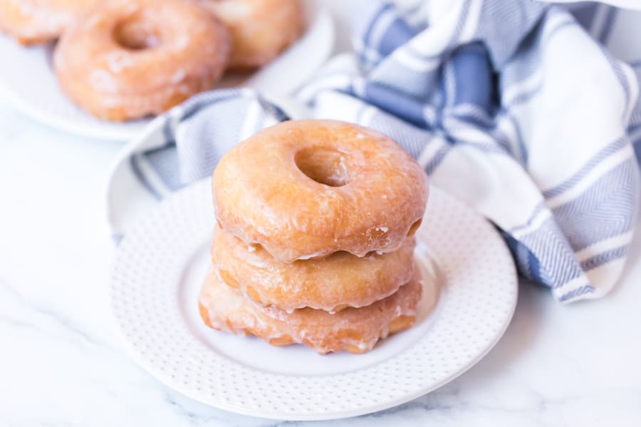 Stack of homemade glazed donuts