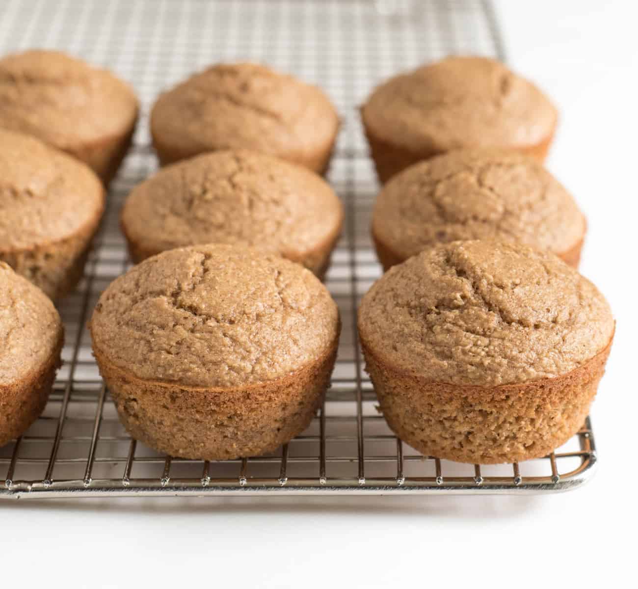 Healthy Apple Cinnamon Muffins that are made in the blender! Made with whole grain oats, apple sauce, maple syrup, and other wholesome ingredients.