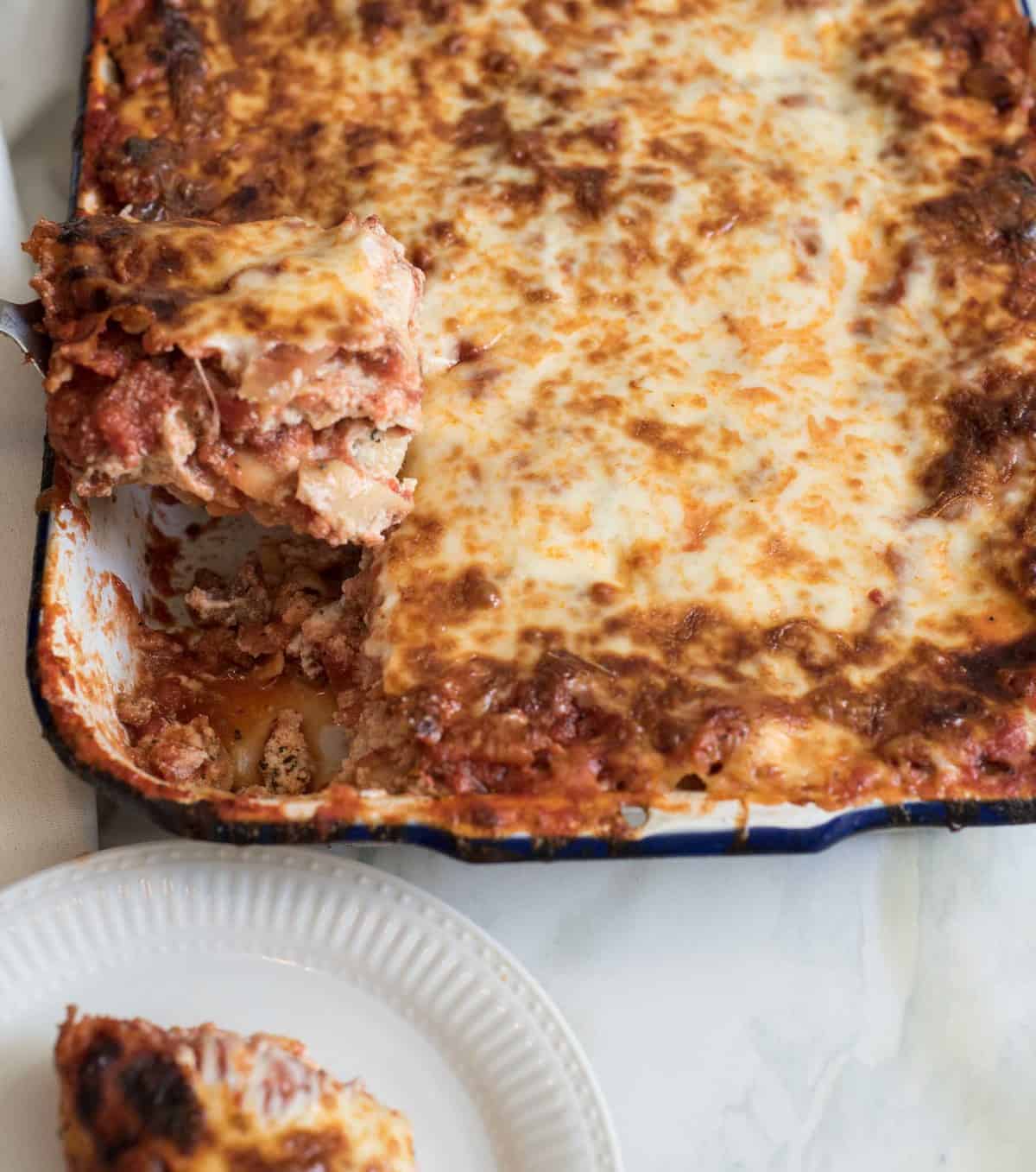 The Best Make-Ahead Lasagna recipe that is also freezer friendly is made with a rich sausage sauce and loads of cheese. This will be your go-to lasagna recipe guaranteed!