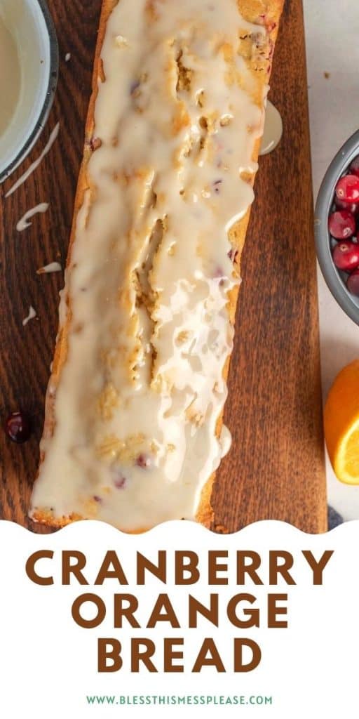 top view of a loaf of cranberry orange bread with glaze on top with the words cranberry orange bread below
