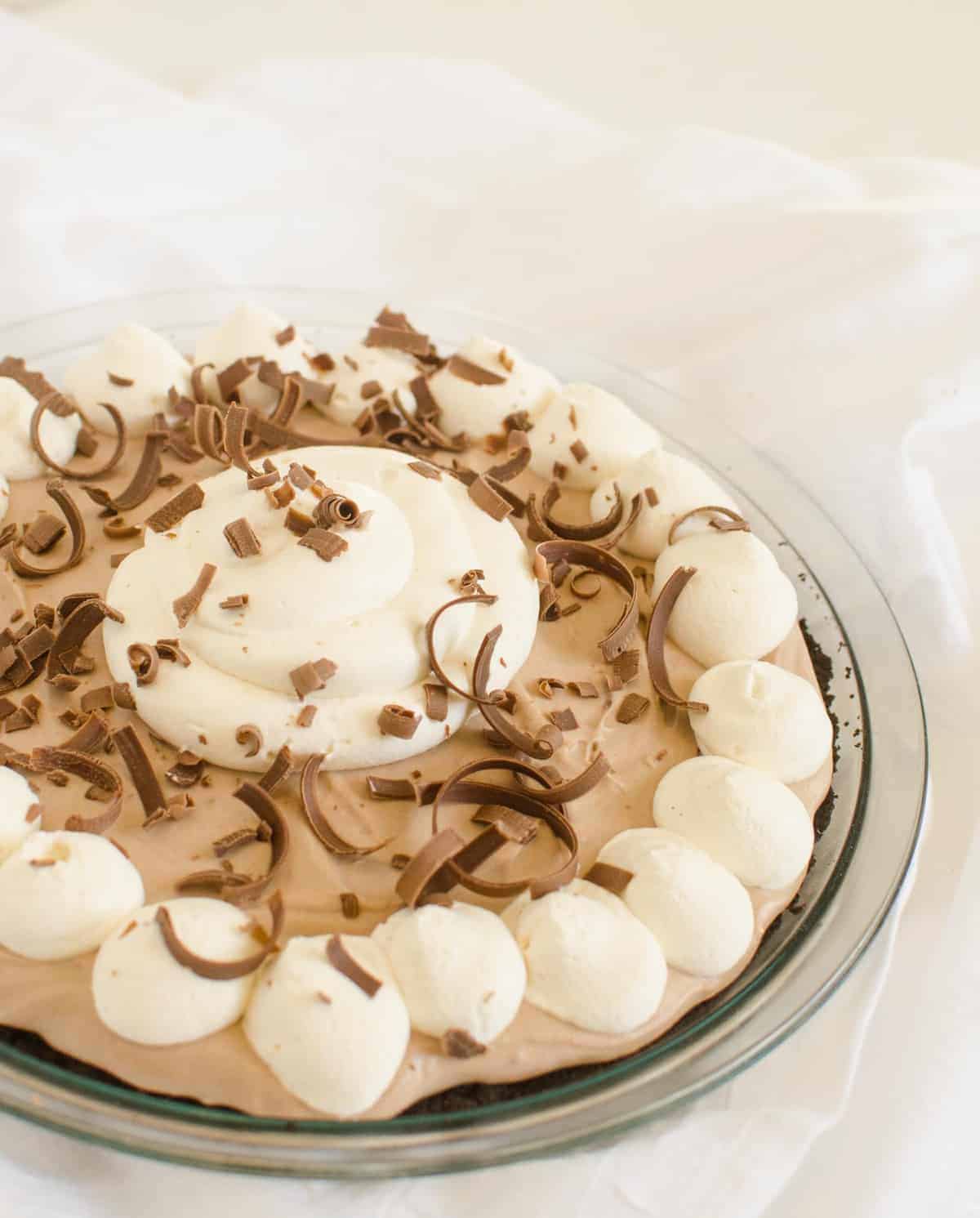 Homemade Chocolate Cream Pie made with dark chocolate, fresh cream, and an Oreo cookie crust. 