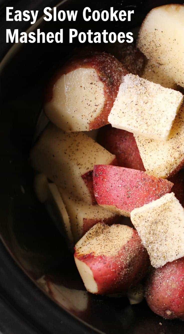 Easy Slow Cooker Mashed potatoes made with red potatoes, milk, and garlic, no peeling needed!