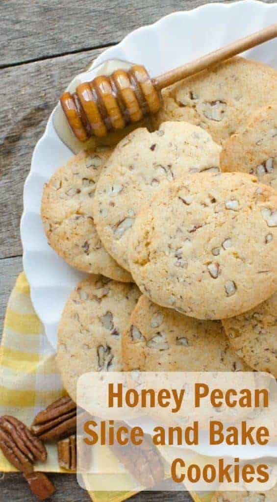 honey pecan cookies on a white plate with a yellow-checkered placemat