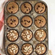 Quick and Easy Healthy Banana Muffins made in the blender with whole grain oats, maple syrup, Greek yogurt and more!