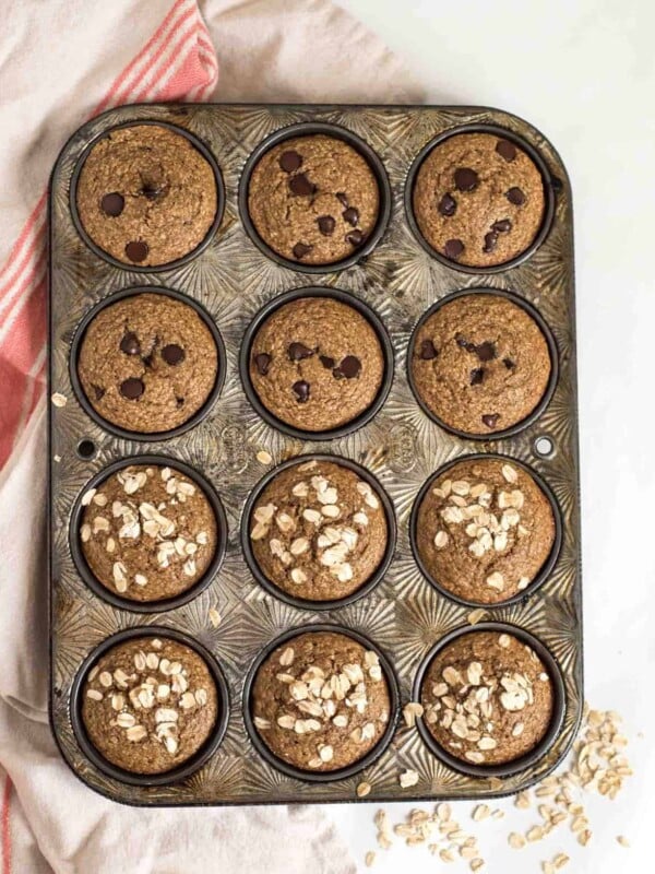 Quick and Easy Healthy Banana Muffins made in the blender with whole grain oats, maple syrup, Greek yogurt and more!