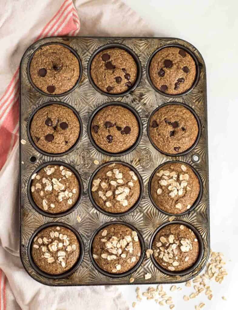 Quick and Easy Healthy Banana Muffins made in the blender with whole grain oats, maple syrup, Greek yogurt and more!
