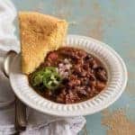 Healthy and flavorful Instant Pot Vegetarian Chili recipe made with a mix of dried beans, vegetables, spices, and a secret ingredient. A healthy, one-pot meatless meal your whole family will love.