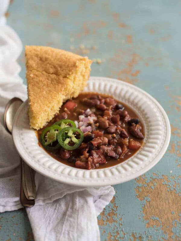 Healthy and flavorful Instant Pot Vegetarian Chili recipe made with a mix of dried beans, vegetables, spices, and a secret ingredient. A healthy, one-pot meatless meal your whole family will love.