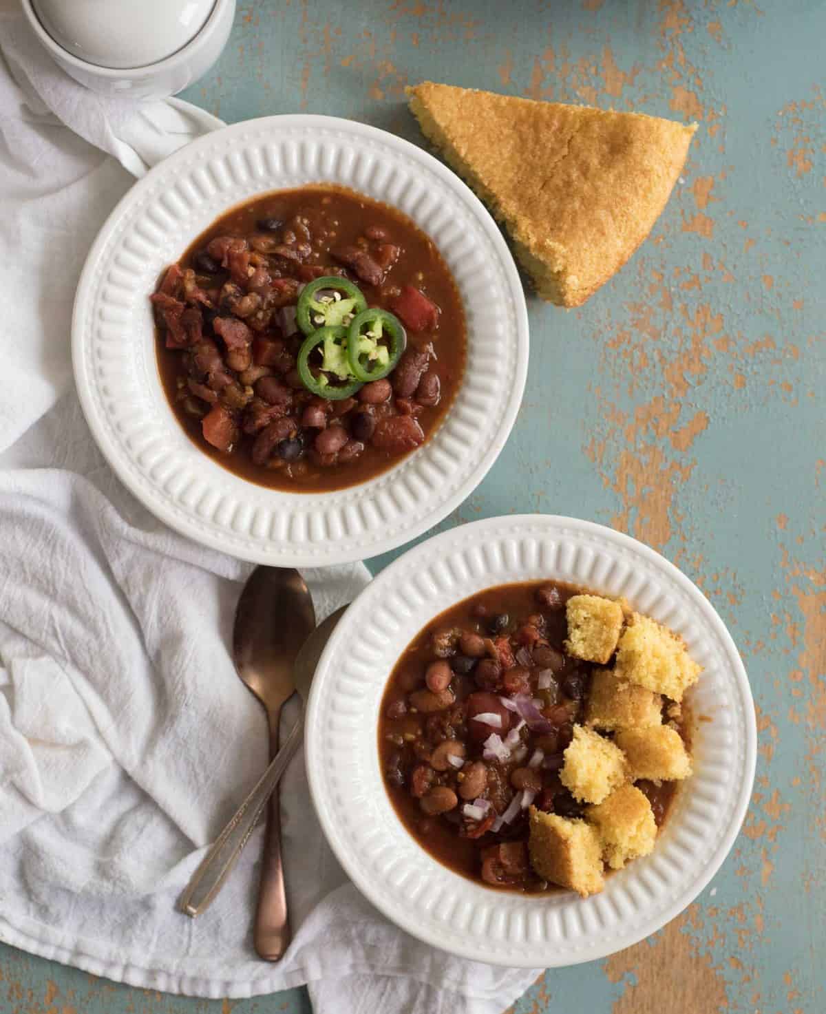 Healthy and flavorful Instant Pot Vegetarian Chili recipe made with a mix of dried beans, vegetables, spices, and a secret ingredient. A healthy one pot meatless meal your whole family will love.