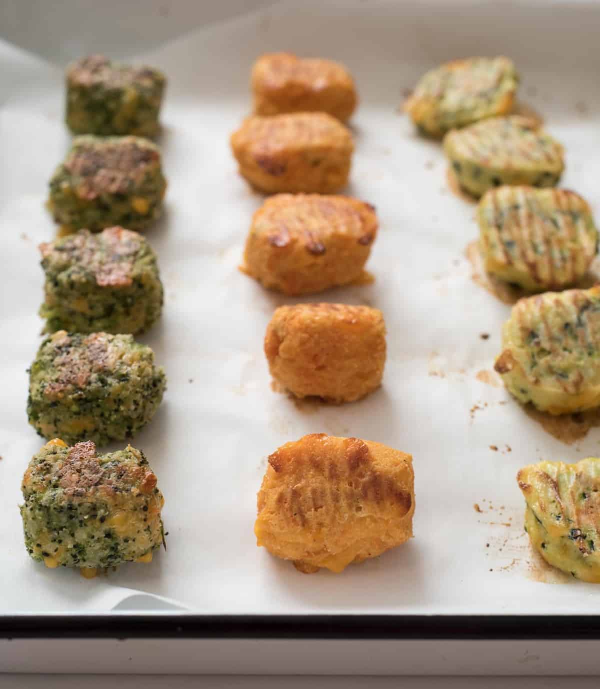 Recipes for healthy veggie tots including broccoli tots, cauli-tots, sweet potatoes tots, zucchini tots, and mixed veggie tots! Perfect for making veggies fun for kids and adults both!