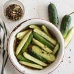 Bowl of sweet and spicy cucumbers and vinegar