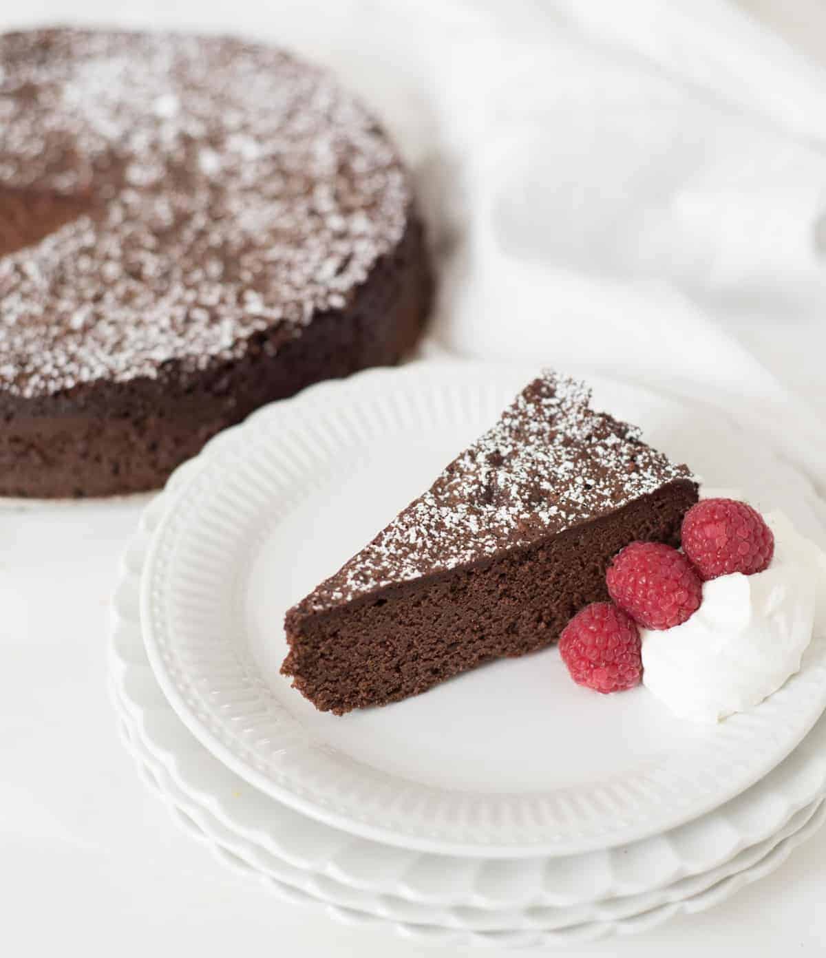 Light and fluffy flourless chocolate torte recipe made from just three simple ingredients. You won't believe how delicious this flourless chocolate torte is.