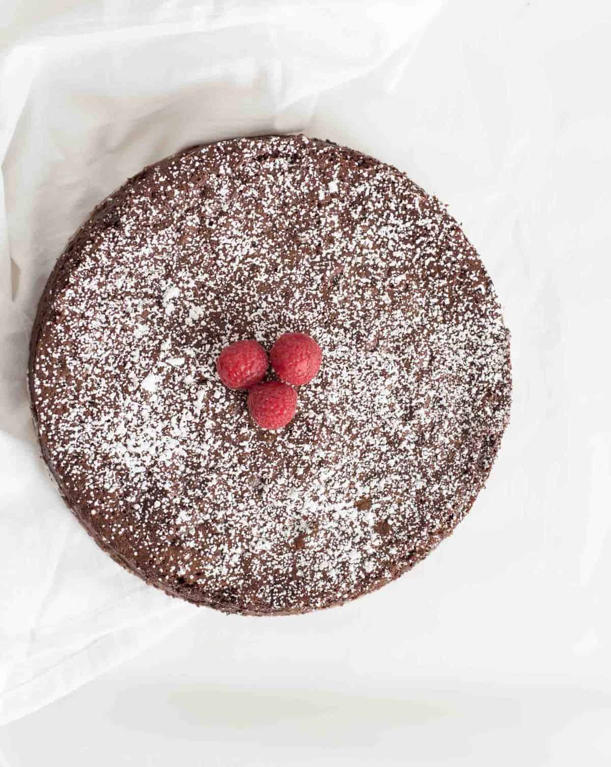 Light and fluffy flourless chocolate torte recipe made from just three simple ingredients. You won't believe how delicious this flourless chocolate torte is.