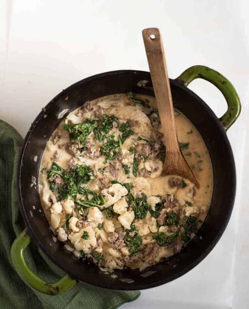 Pot of cauliflower sausage and kale soup