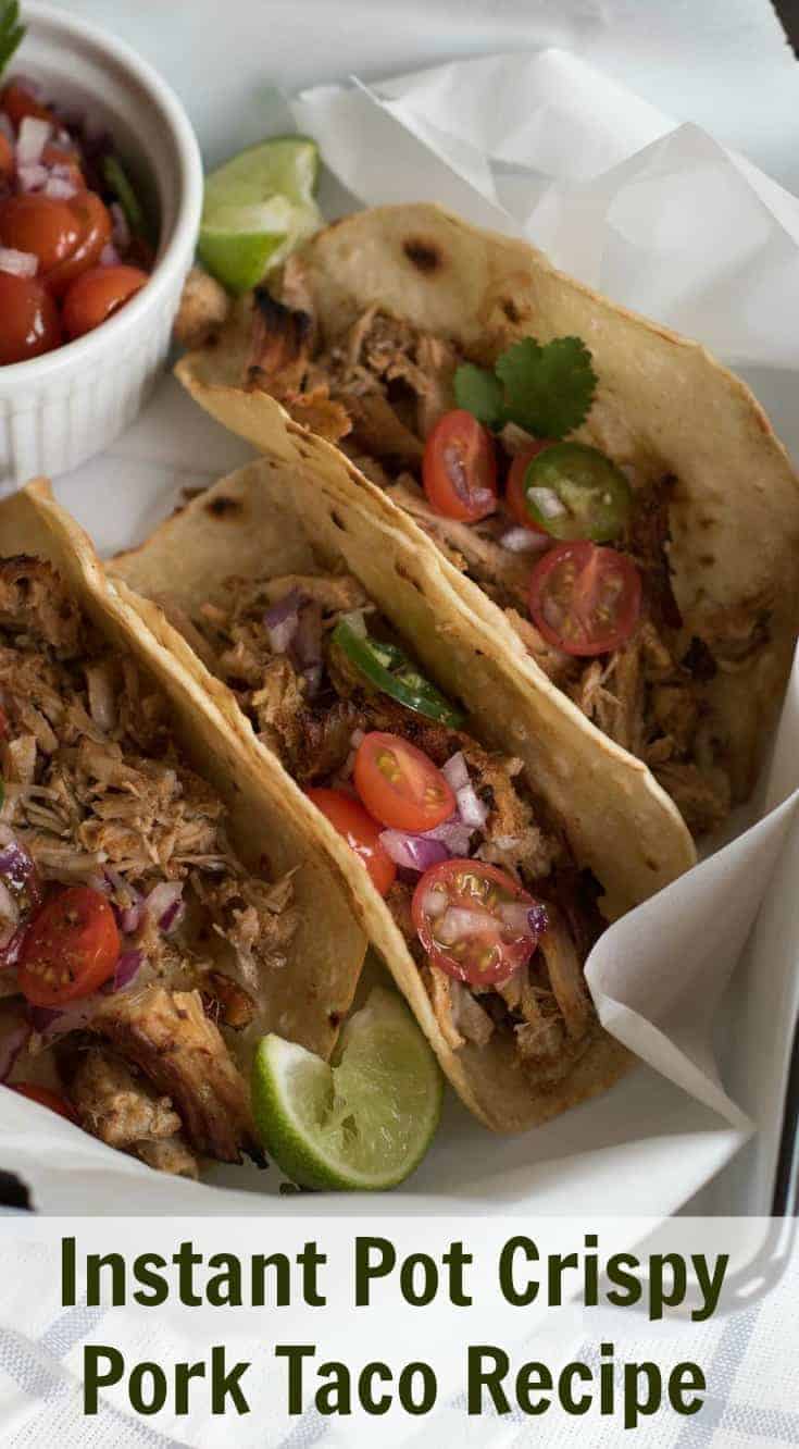 The best Instant Pot pork taco recipe on the internet. The secret is a whole lot of seasoning cooked into the pork and then finishing the dish under the broiler in your oven.