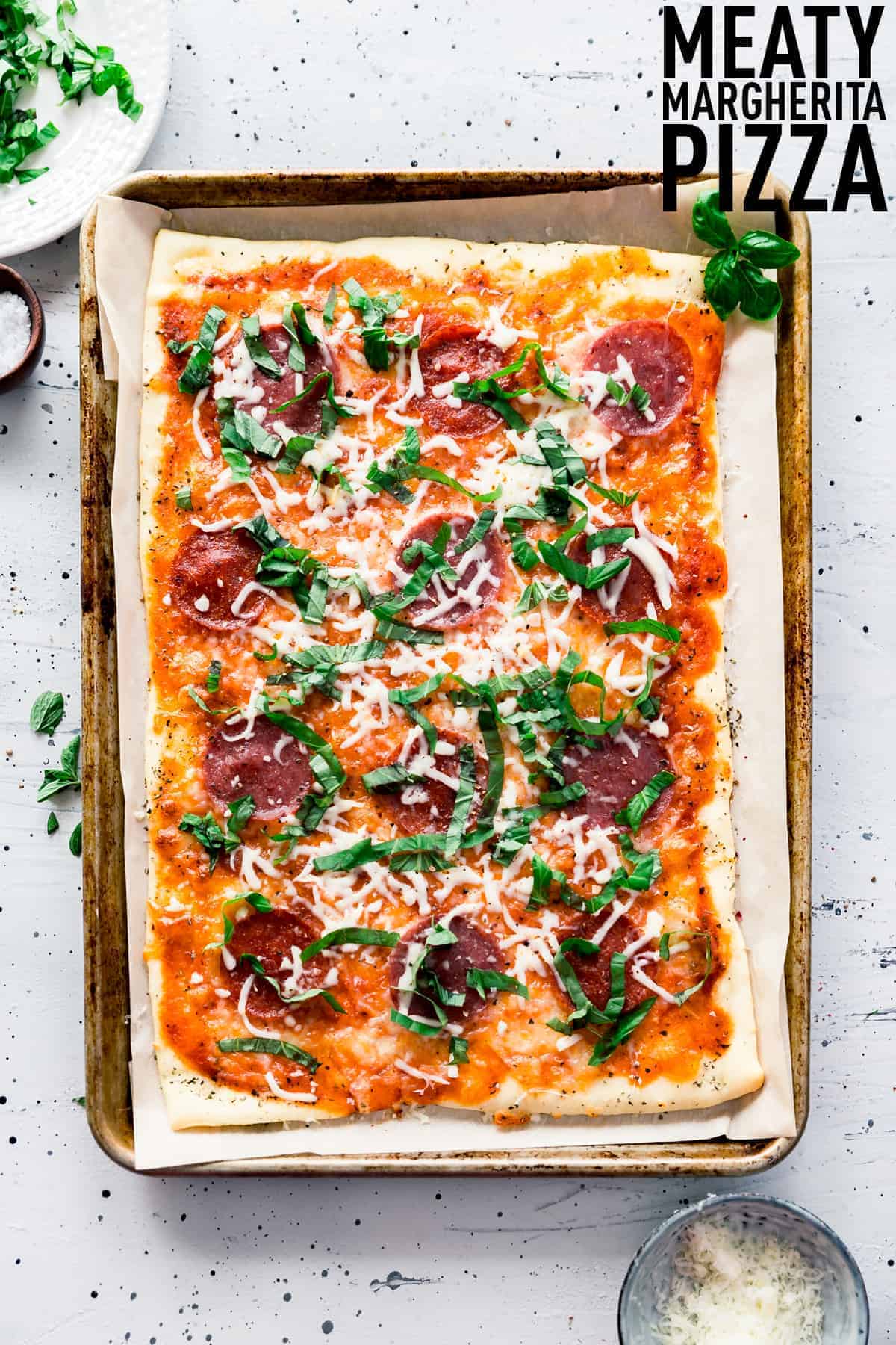Meaty Margherita Pizza made with the traditional tomatoes, cheese, and basil but with added pepperoni and salami to make it one crowd pleasing pizza done in only 30 minutes.