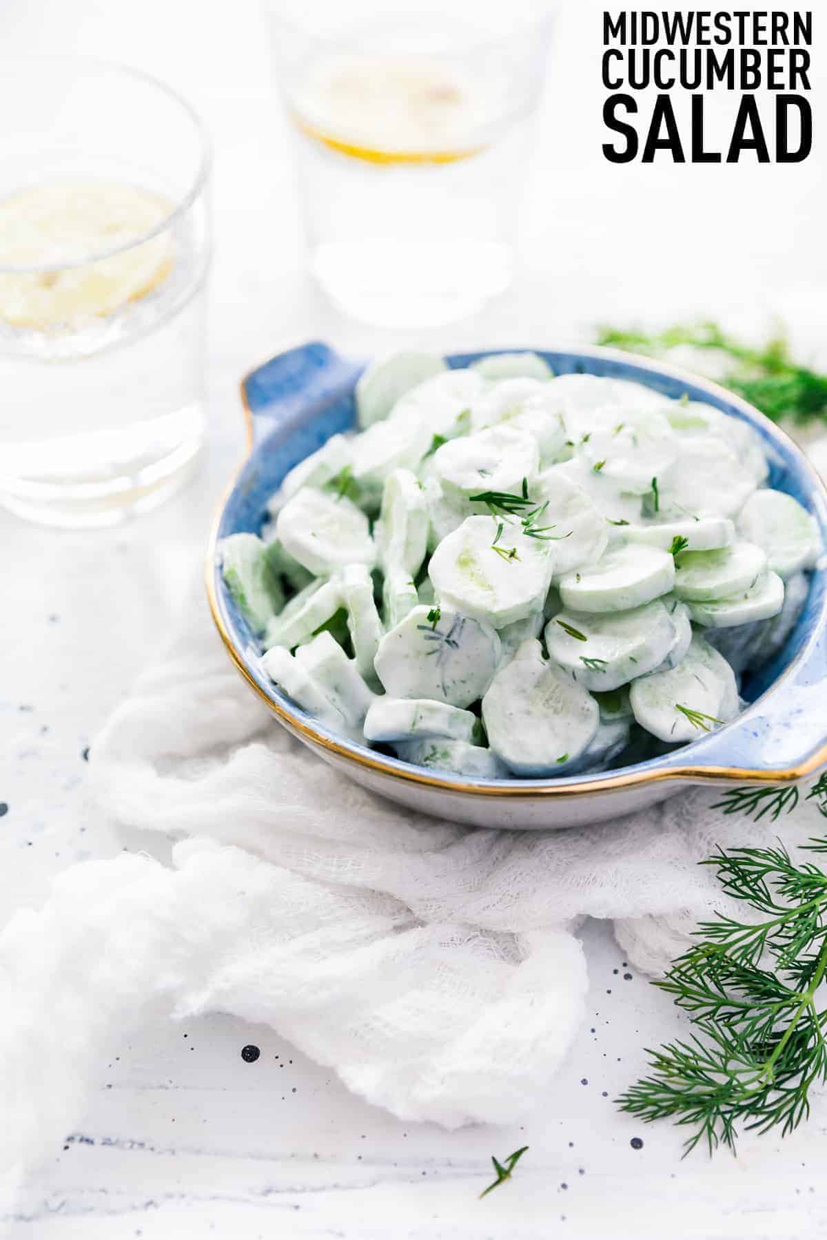 Midwestern Creamy Cucumber and Vinegar Salad made with fresh cucumbers, sour cream, vinegar, and fresh herbs, a summer stable for every picnic and cookout! 