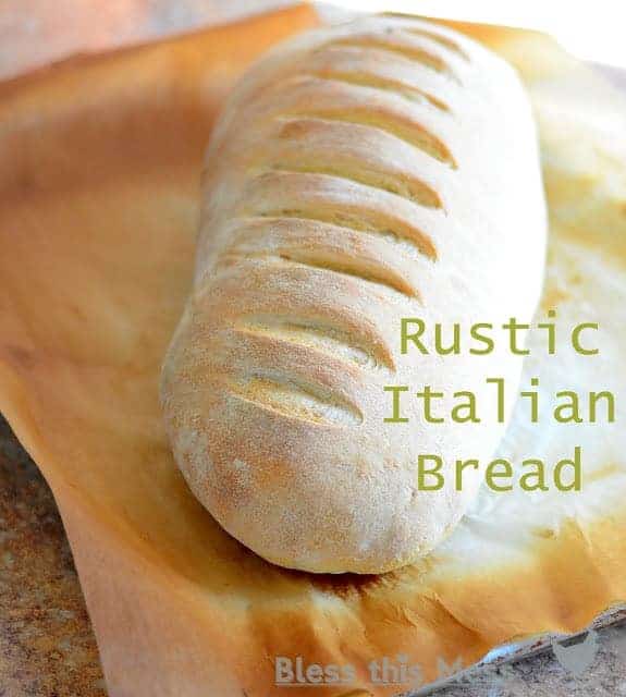 This simple Italian bread recipe is crusty on the outside but light & fluffy on the inside. Slice & serve with bowls of soup, or make amazing sandwiches!