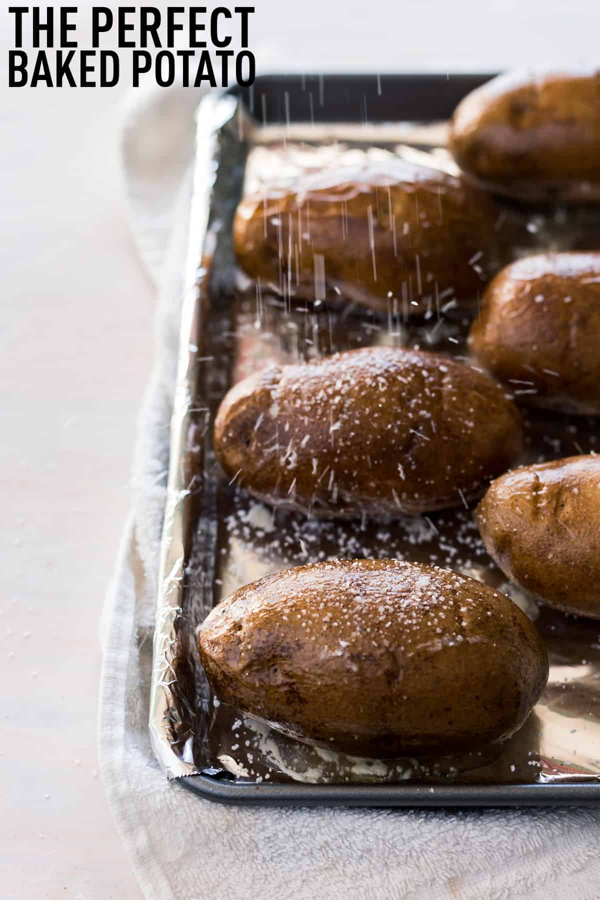 The perfect Steakhouse Baked Potato that is crispy on the outside and extra fluffy in the middle, made with only 3 simple ingredients and done in less than an hour! 