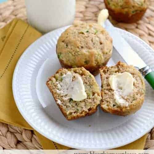 zucchini muffin cut in half with butter