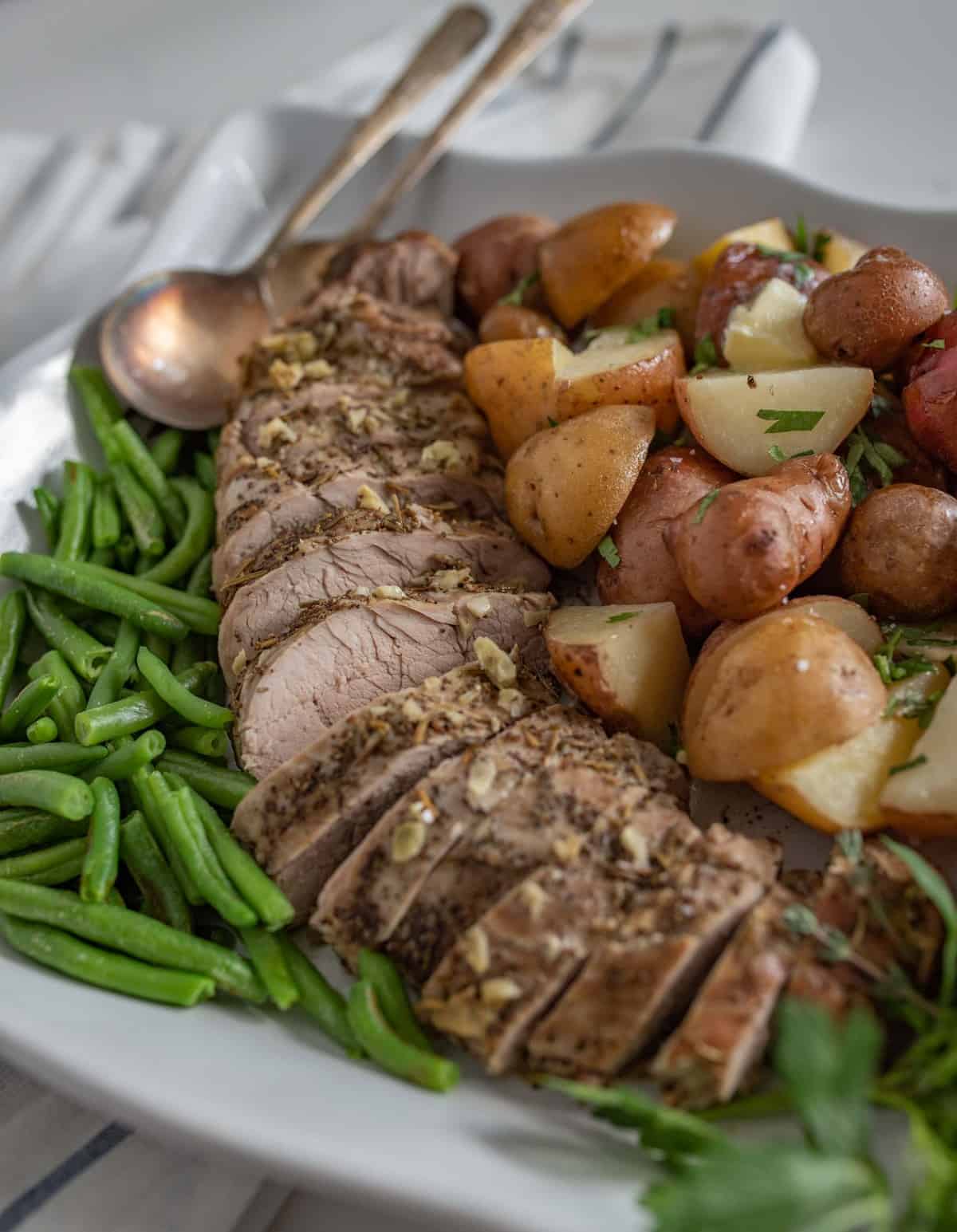 Slow Cooker Pork Tenderloin and Potatoes make the perfect simple dinner with moist and flavorful pork and potatoes that aren't over cooked or soggy.
